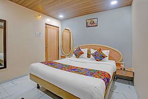 Fabhotel Stay Land Plus