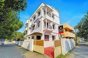 Fabhotel Fort Beach Residency