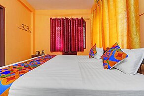 Fabhotel Fort Beach Residency