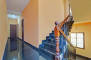 Fabhotel Fort Beach Residency