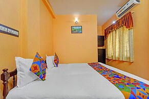 Fabhotel Fort Beach Residency