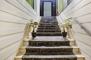 Fabhotel Abrol Suites