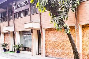 Fabhotel Abrol Suites