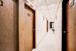 Fabhotel Abrol Suites