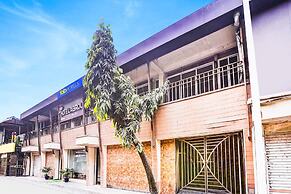 Fabhotel Abrol Suites