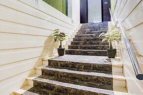 Fabhotel Abrol Suites