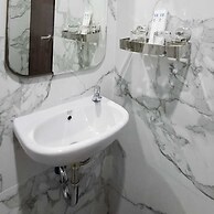 Front One Hotel Mesir Surabaya