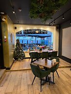 Bella Vita Hotel en Restaurant