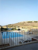 Veduta ta' Pinu Holiday Residences