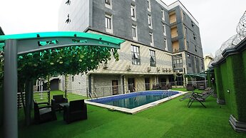 Deluxe Indulgence Hotel and Suites