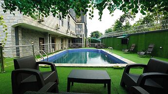 Deluxe Indulgence Hotel and Suites