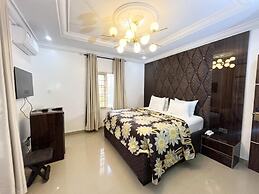Deluxe Indulgence Hotel and Suites