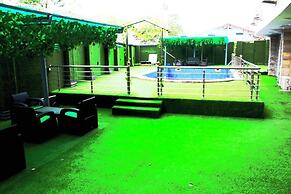 Deluxe Indulgence Hotel and Suites