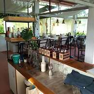 Rustic Palms - Restaurant & Cabins