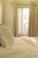 Elysium Suites & Apartments