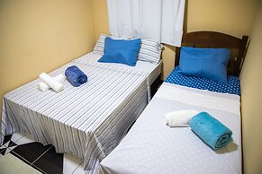 Casa com Wi-fi e Churrasqueira a 300m da Praia