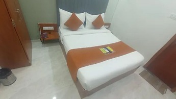 Fabhotel Kamari Inn