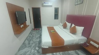 Fabhotel Kamari Inn