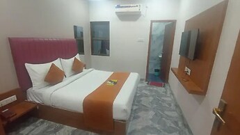 Fabhotel Kamari Inn