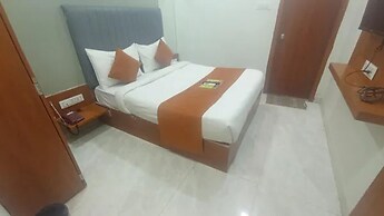 Fabhotel Kamari Inn