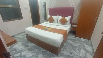 Fabhotel Kamari Inn
