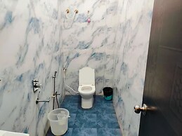 Fabhotel Kamari Inn