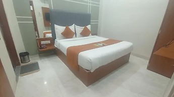 Fabhotel Kamari Inn