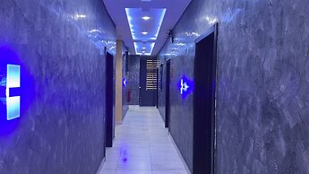 Next Level Hotel & Suites