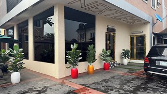 Next Level Hotel & Suites