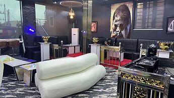 Next Level Hotel & Suites