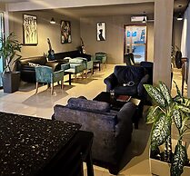 Tris Estates Hotel & Suites