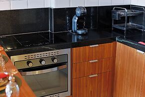 Studio Pet Friendly c Garagem e Varanda no Centro