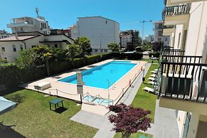 Apartment With Balcony and Pool Access