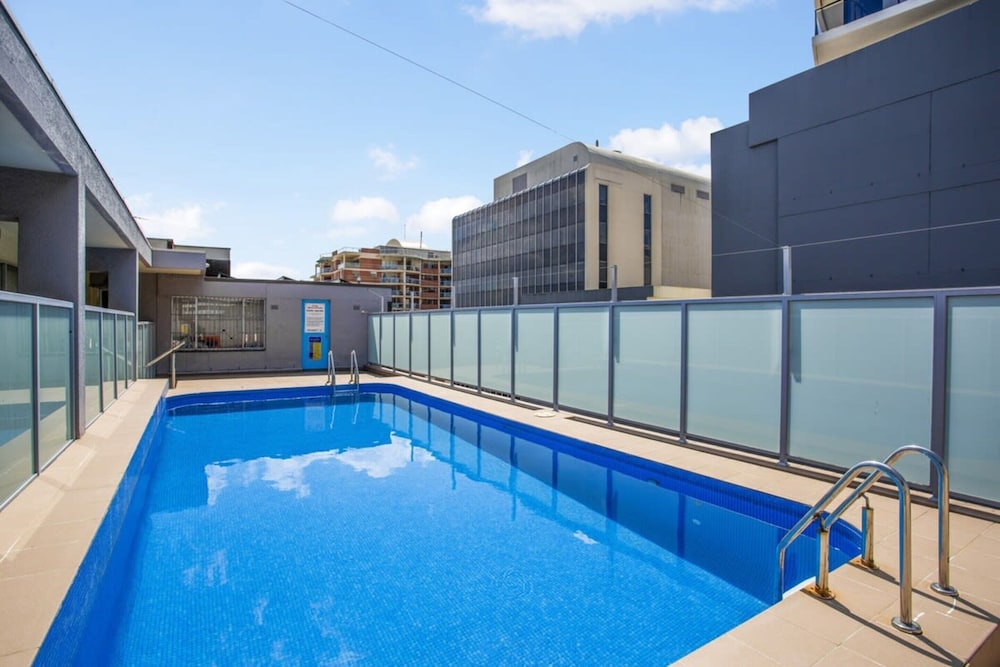 Chic Studio With a Pool and Moments From Shop