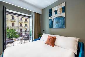 MH SUITES PLEBISCITO