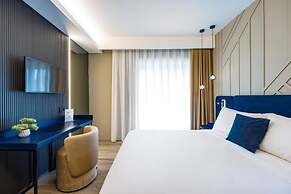 MH SUITES PLEBISCITO