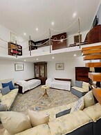 DE VIVO REALTY - COCO'S APARTMENTS