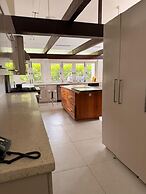 Nature-inspired 4BR Modern Villa Pool Resort Access