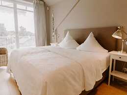 Heikendorf Penthouse Suite by Belvilla
