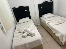 Merkez Pansiyon Sarımsaklı