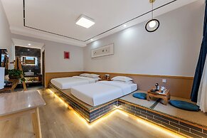 ManBuYunDuan.Theme Inn