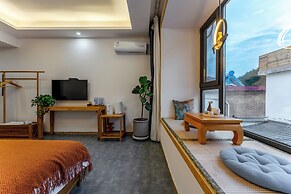 ManBuYunDuan.Theme Inn