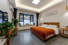 ManBuYunDuan.Theme Inn