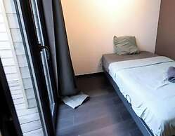 La Terrasse Proche des Places 2 Chambres