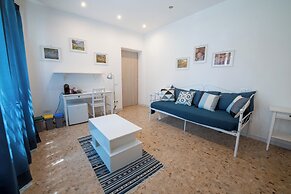 Casa Rosa Beige e Blu