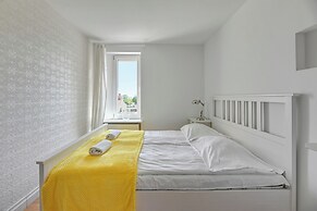 Surfer by Grand Apartments