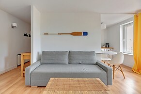 Surfer by Grand Apartments