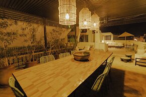 Riad Della
