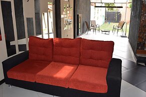 Acosta Ñu Apart Hotel