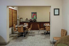 Hanu Reddy Residences Wallace Garden